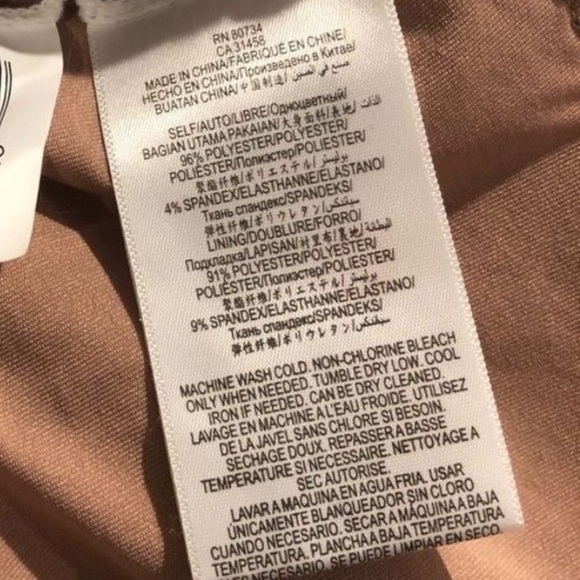 BCBG Maxazria Vicktoria Peplum Lace Blouse
Black Tan medium - Picture 16 of 16